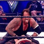 the-undertaker-tongue-out.gif