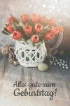text-alles-gute-zum-geburtstag-auf-deutsch-haufen-rote-blumen-im-holz-vase-des-zweigrattans-ru...jpg