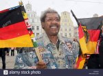 us-boxing-promoter-don-king-waves-german-flags-on-the-market-square-D57K2G.jpg